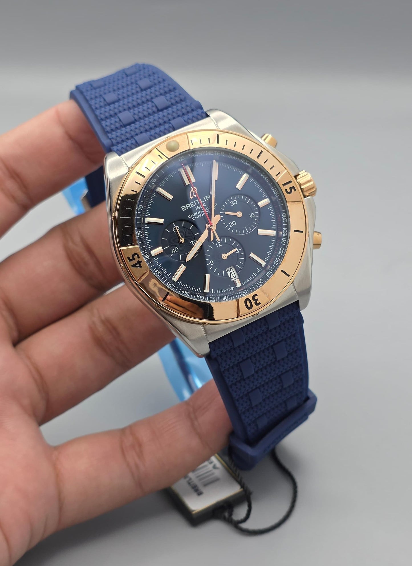 Luxury Chronograph Watch with Blue Dial, Gold-Tone Bezel & Blue Rubber Strap