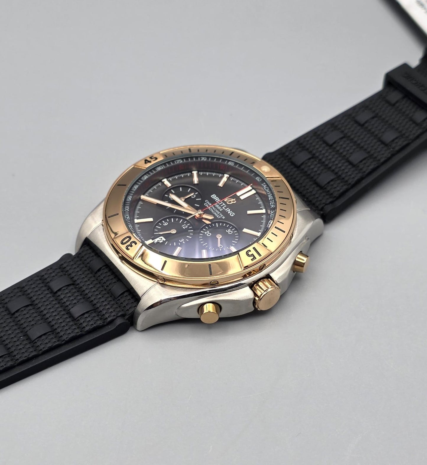 Luxury Chronograph Watch with Gray Dial, Gold-Tone Beze & Black Rubber Strap