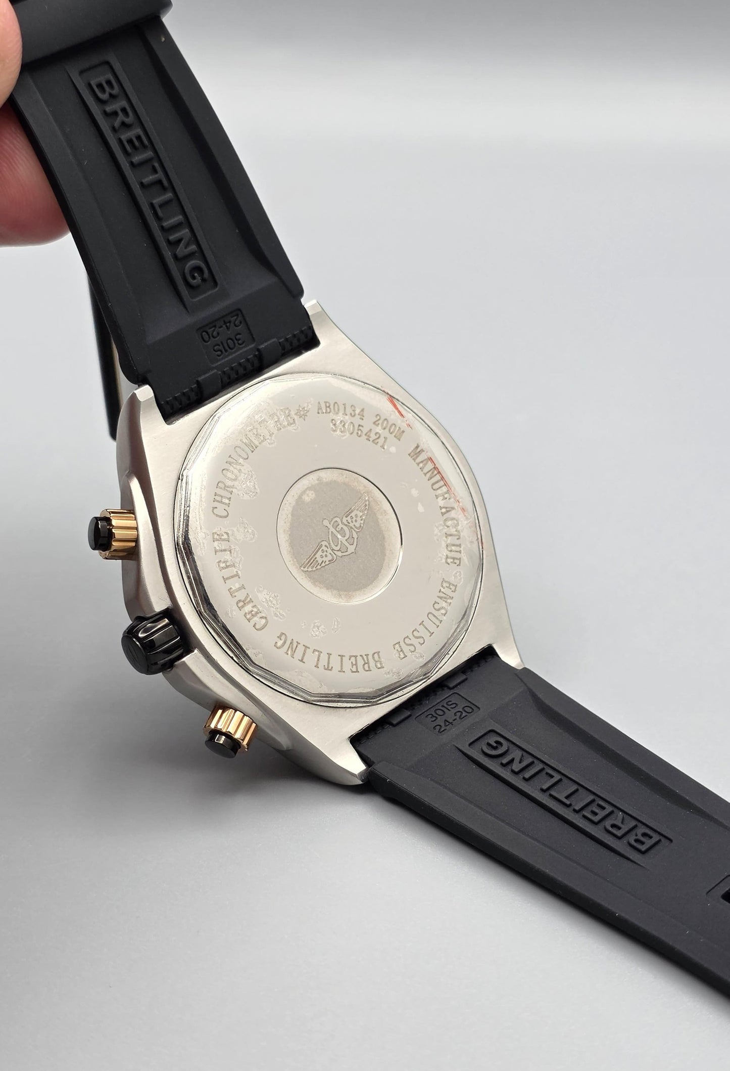 Luxury Chronograph Watch with Gray Dial, Gold-Tone Beze & Black Rubber Strap