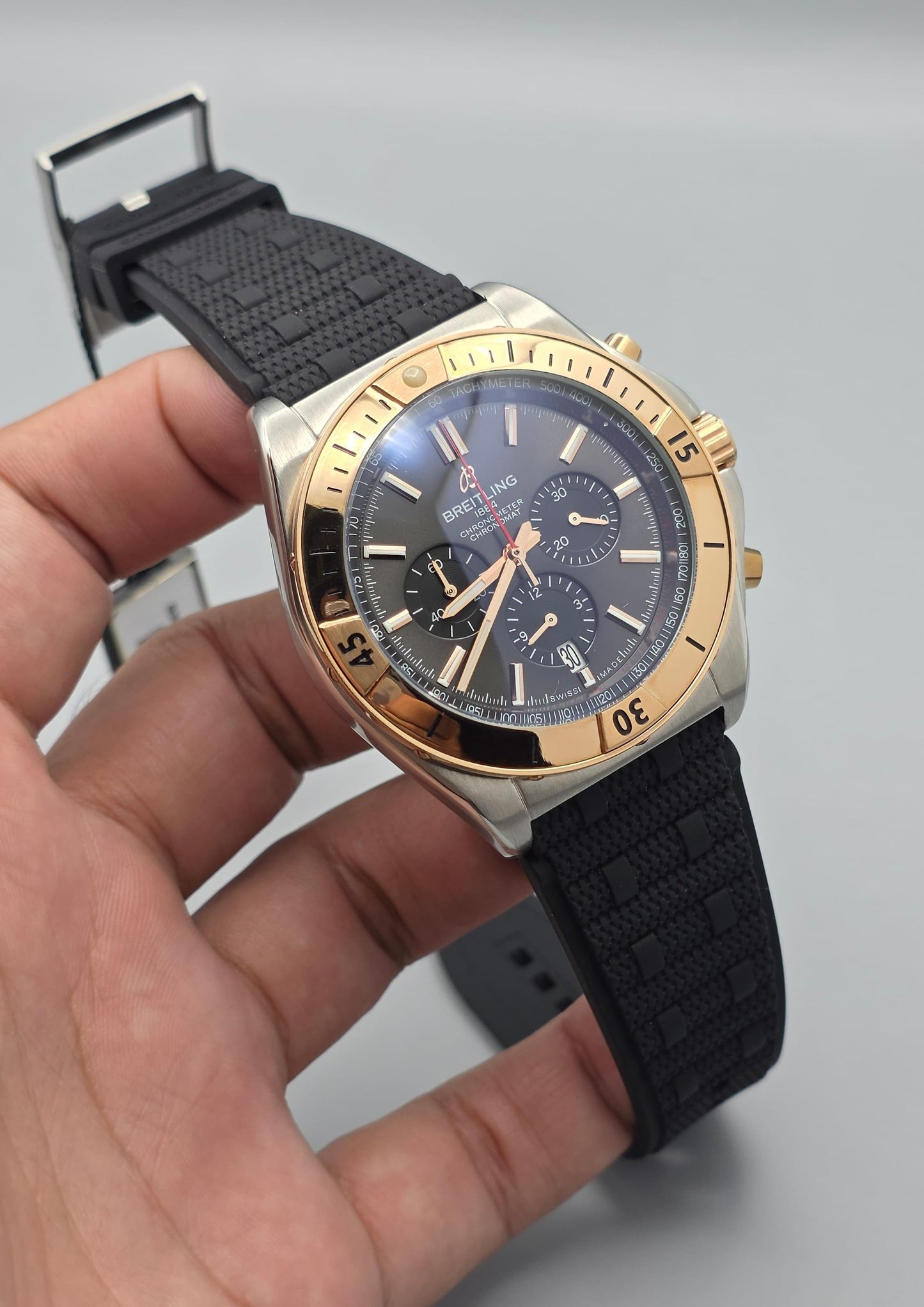 Luxury Chronograph Watch with Gray Dial, Gold-Tone Beze & Black Rubber Strap